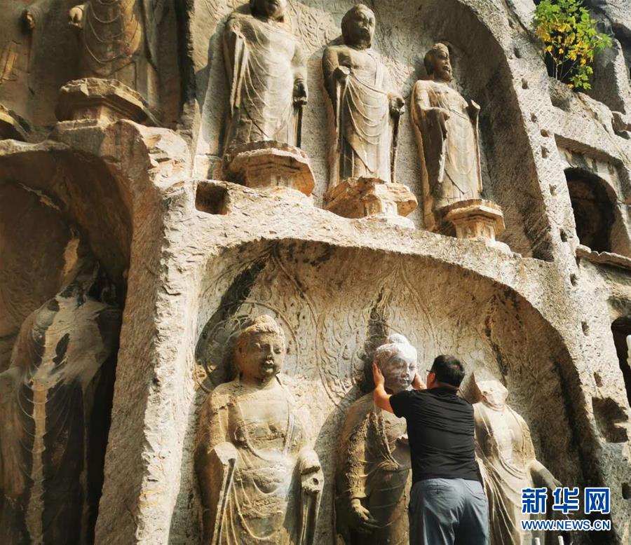 （圖文互動）（4）合體了，龍門石窟流散佛首首次實現(xiàn)“數(shù)字復(fù)位”