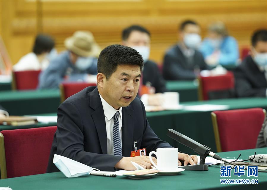 （新華全媒頭條·圖文互動）（5）從人民中汲取磅礴力量——習(xí)近平總書記同出席2020年全國兩會人大代表、政協(xié)委員共商國是紀(jì)實(shí)