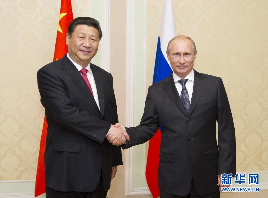 9月11日，中國國家主席習(xí)近平在塔吉克斯坦首都杜尚別會見俄羅斯總統(tǒng)普京。 新華社記者 黃敬文 攝 