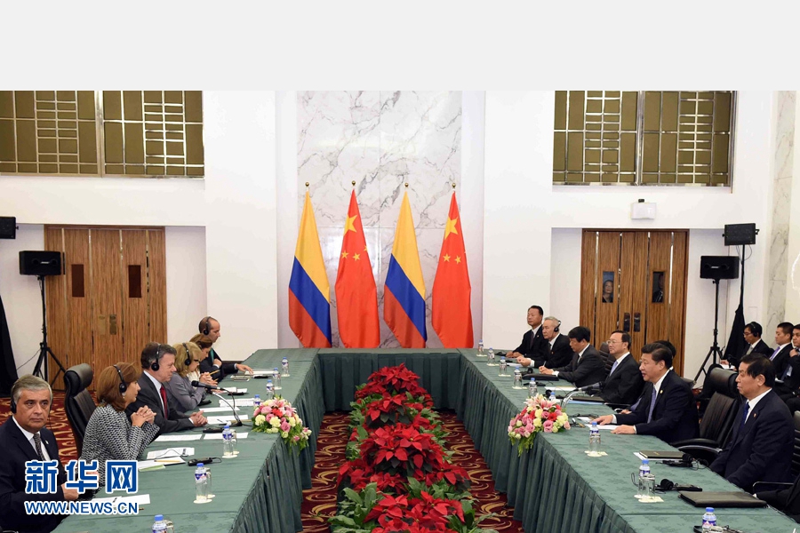 11月18日，國(guó)家主席習(xí)近平在菲律賓馬尼拉會(huì)見哥倫比亞總統(tǒng)桑托斯。 新華社記者 饒愛民 攝