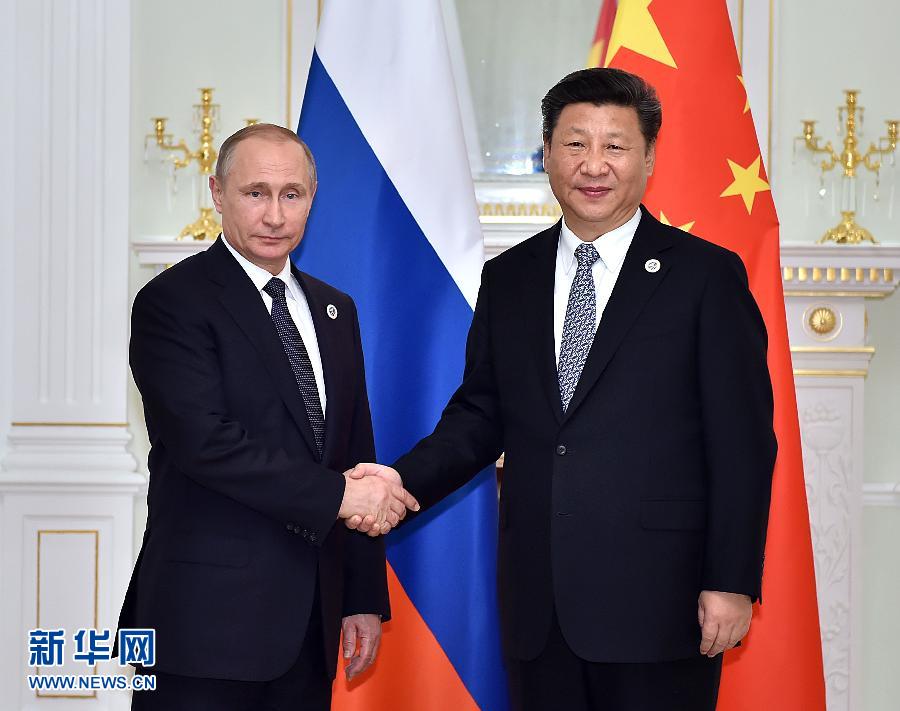 6月23日，國家主席習(xí)近平在烏茲別克斯坦塔什干會見俄羅斯總統(tǒng)普京。新華社記者李濤攝